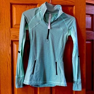 Lululemon Half Zip Sweatshirt. Size 4. Light green with black stripes.